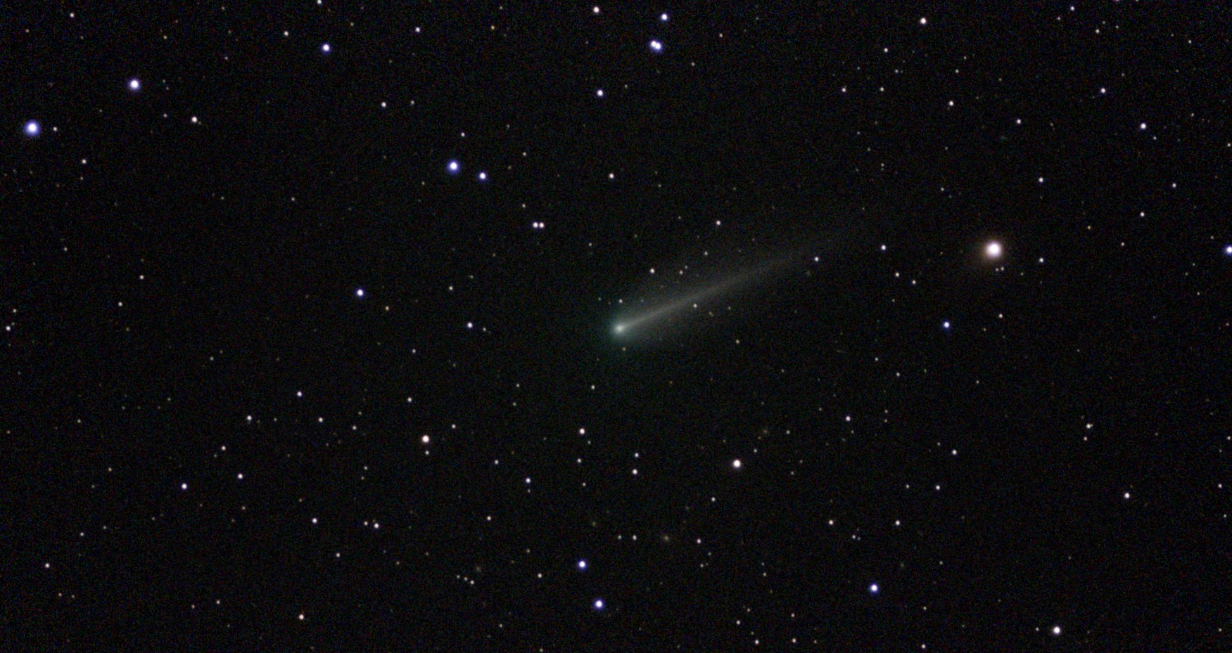 Comet 220P/McNaught viewed from my backyard with a Vespera 1 Telescope. Composite of 96 exposures (960 sec)