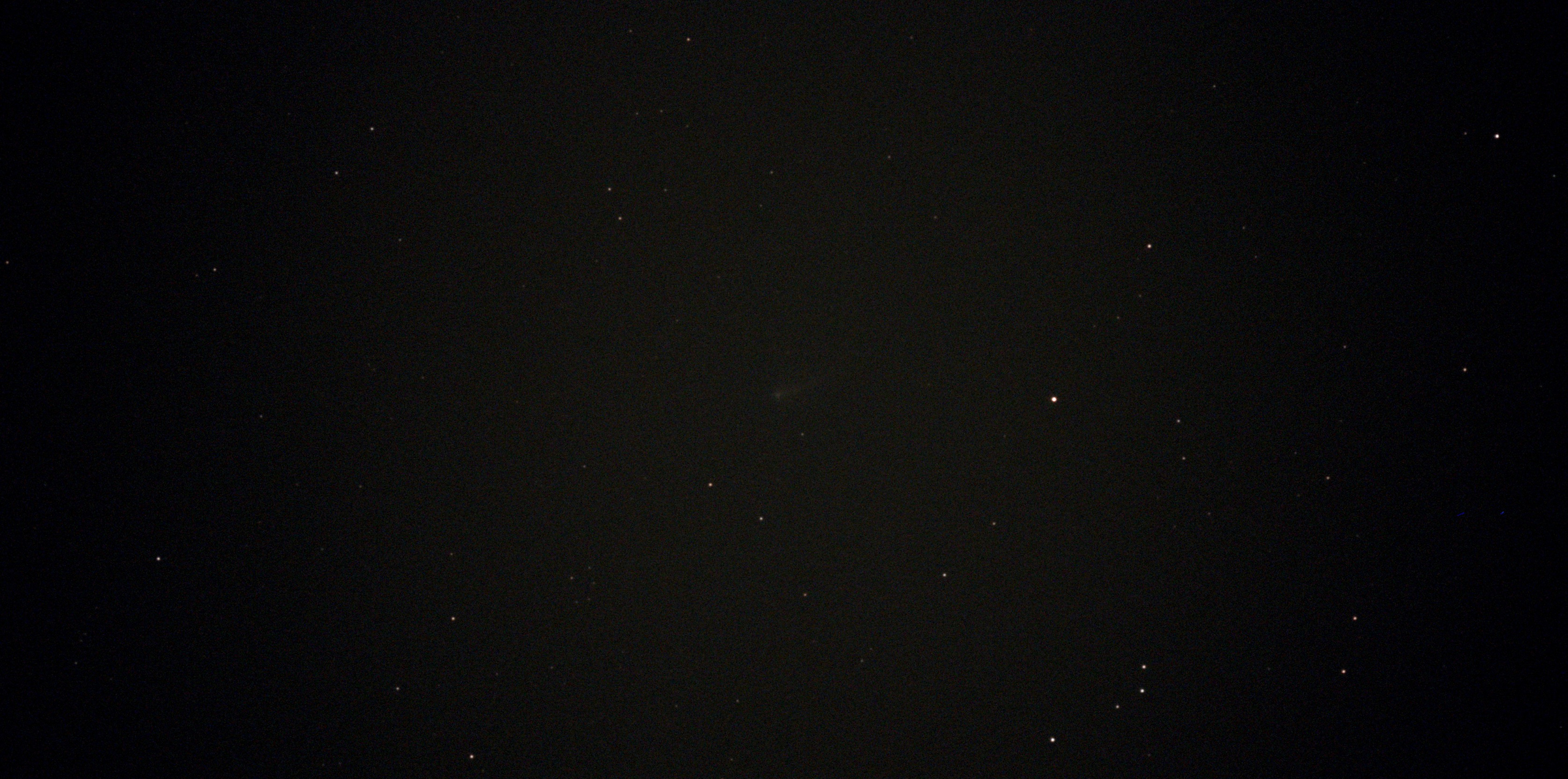 Comet 220P/McNaught viewed from my backyard with a Vespera 2 Telescope. Composite of 21 exposures (210 sec)