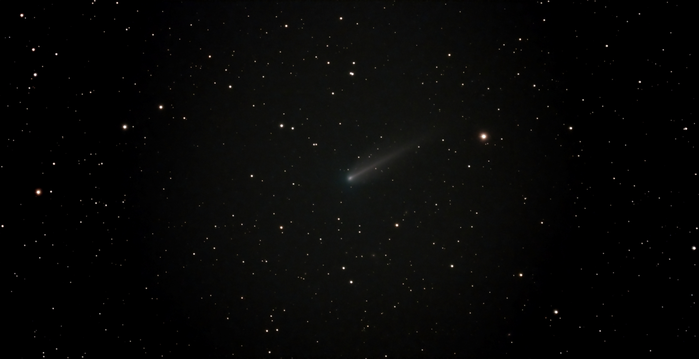 Comet 220P/McNaught viewed from my backyard with a Vespera 2 Telescope. Composite of 137 exposures (1370 sec).