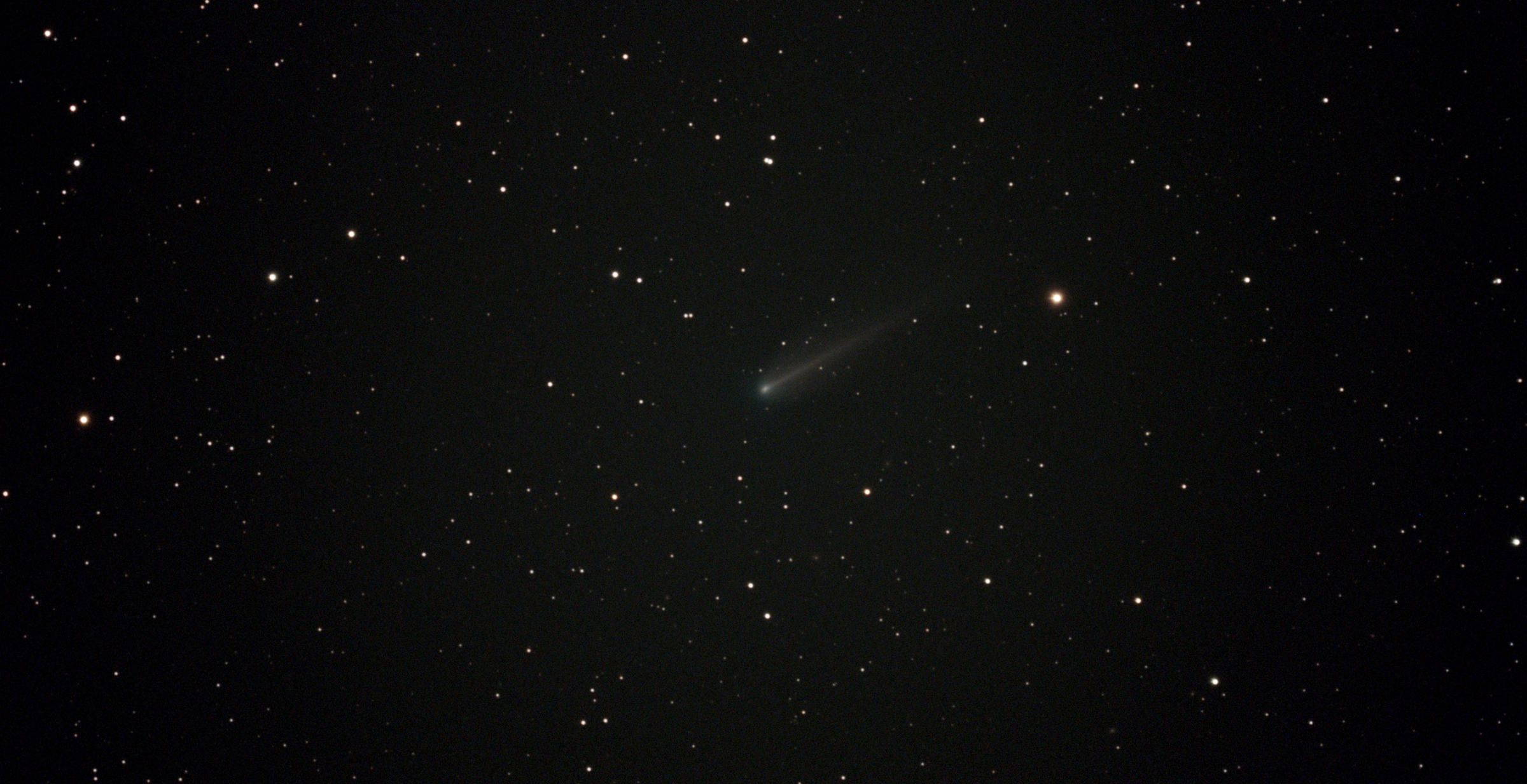 Comet 220P/McNaught viewed from my backyard with a Vespera 2 Telescope. Composite of 137 exposures (1370 sec).